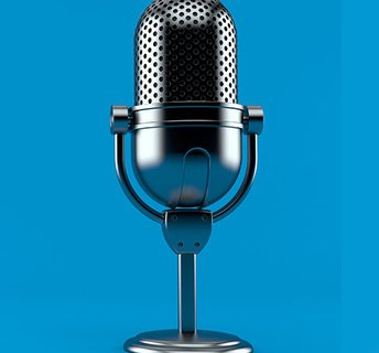 Chrome microphone on blue  tile